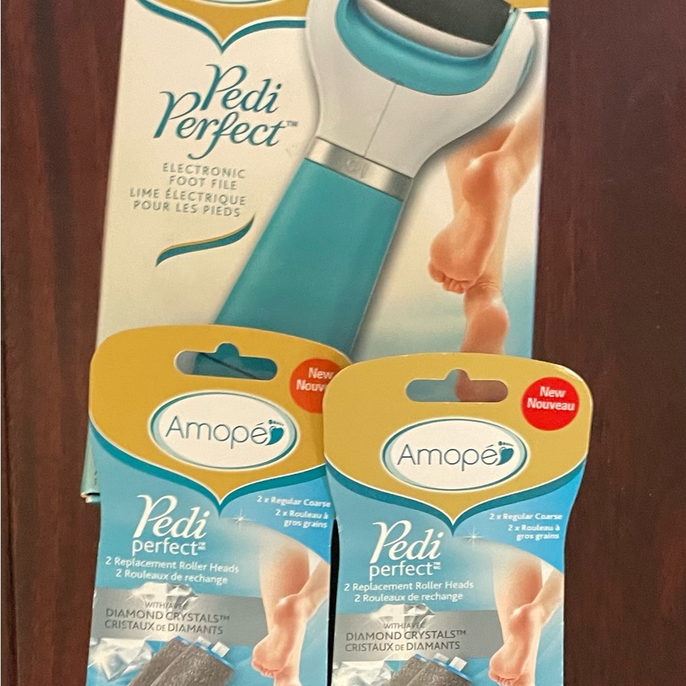 Pedi Perfect Electronic Foot File With Refill Roller Heads ….  ALL NEW IN BOX